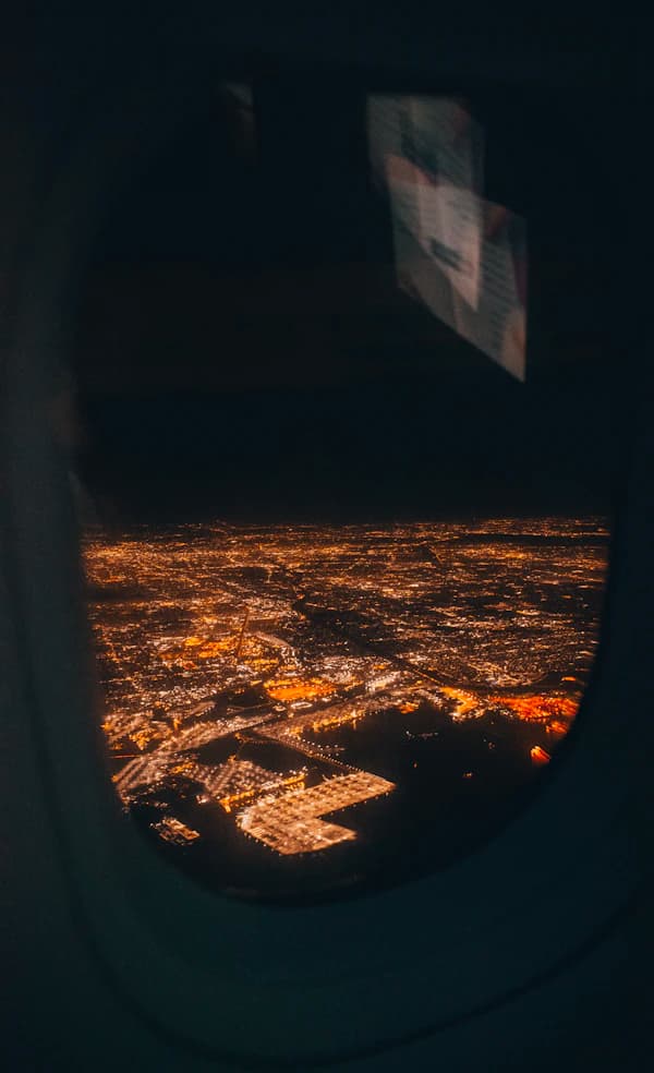 Aerial view of a city glowing at night